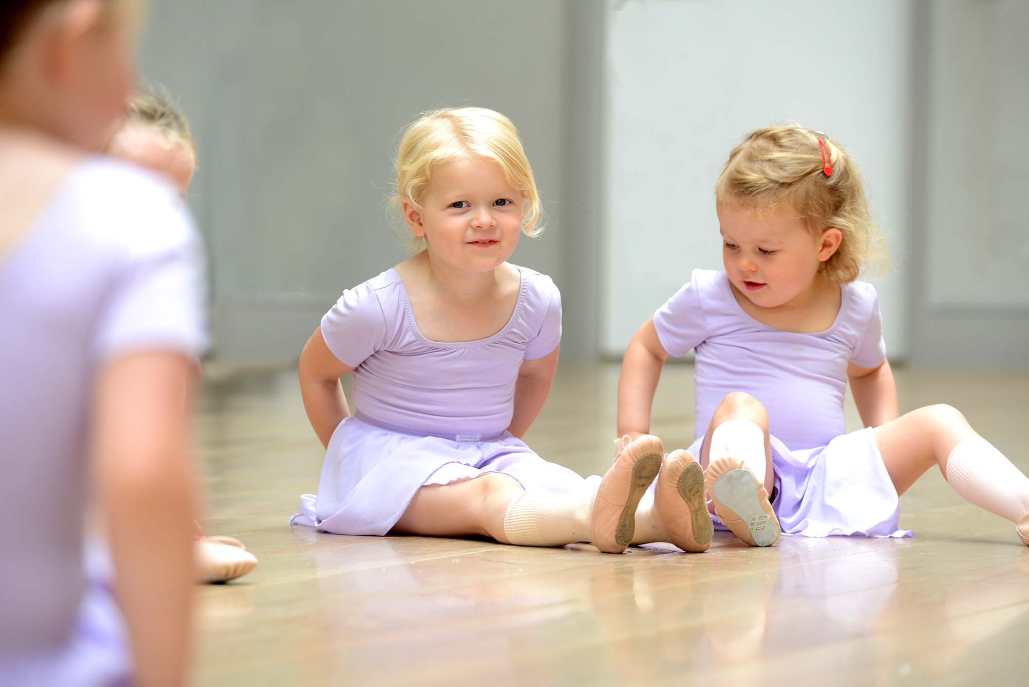 A young child settling happily into a dance class at Intune Dance